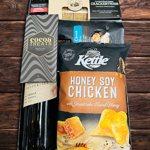 Cocoa Treats dark chocolate,Byron Bay cookie pouch,Valley produce black paper crackerthing,Kettle chickenchips,Australian Quince paste hamper