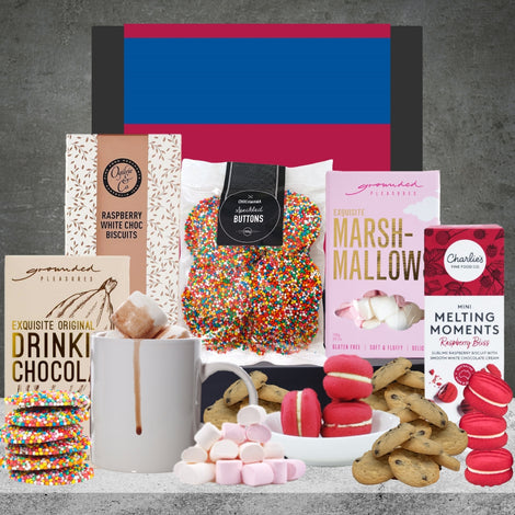 AFL gift hamper featuring chocolates and assorted sweet treats