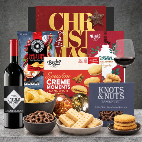 Cabernet Sauvignon Wine Christmas Hamper featuring The Untold Story red wine, chocolate-coated pretzels, Christmas shortbread and biscuits.