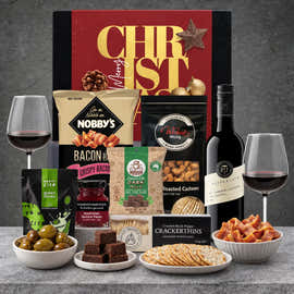 Christmas red wine hamper for him featuring Pepperjack Barossa Cabernet Sauvignon, green olives, pepper crackerthins, honey cashews and dark chocolate mint fudge