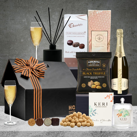 Home Sweet Home Hamper featuring sparkling wine and indulgent treats
