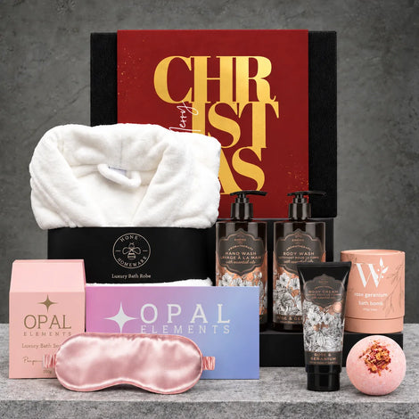 Rose and geranium Christmas pamper gift box with floral body care products and relaxing bath essentials