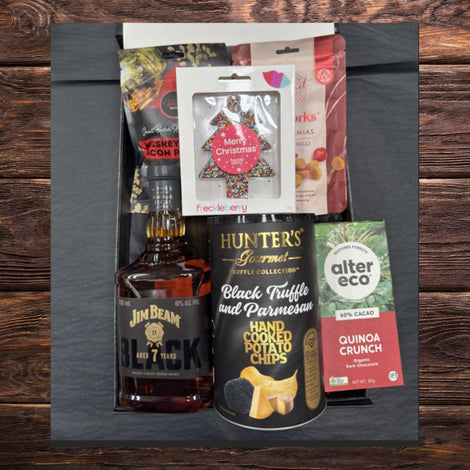 Vegan Christmas bourbon gift hamper with premium bourbon and festive gourmet snacks