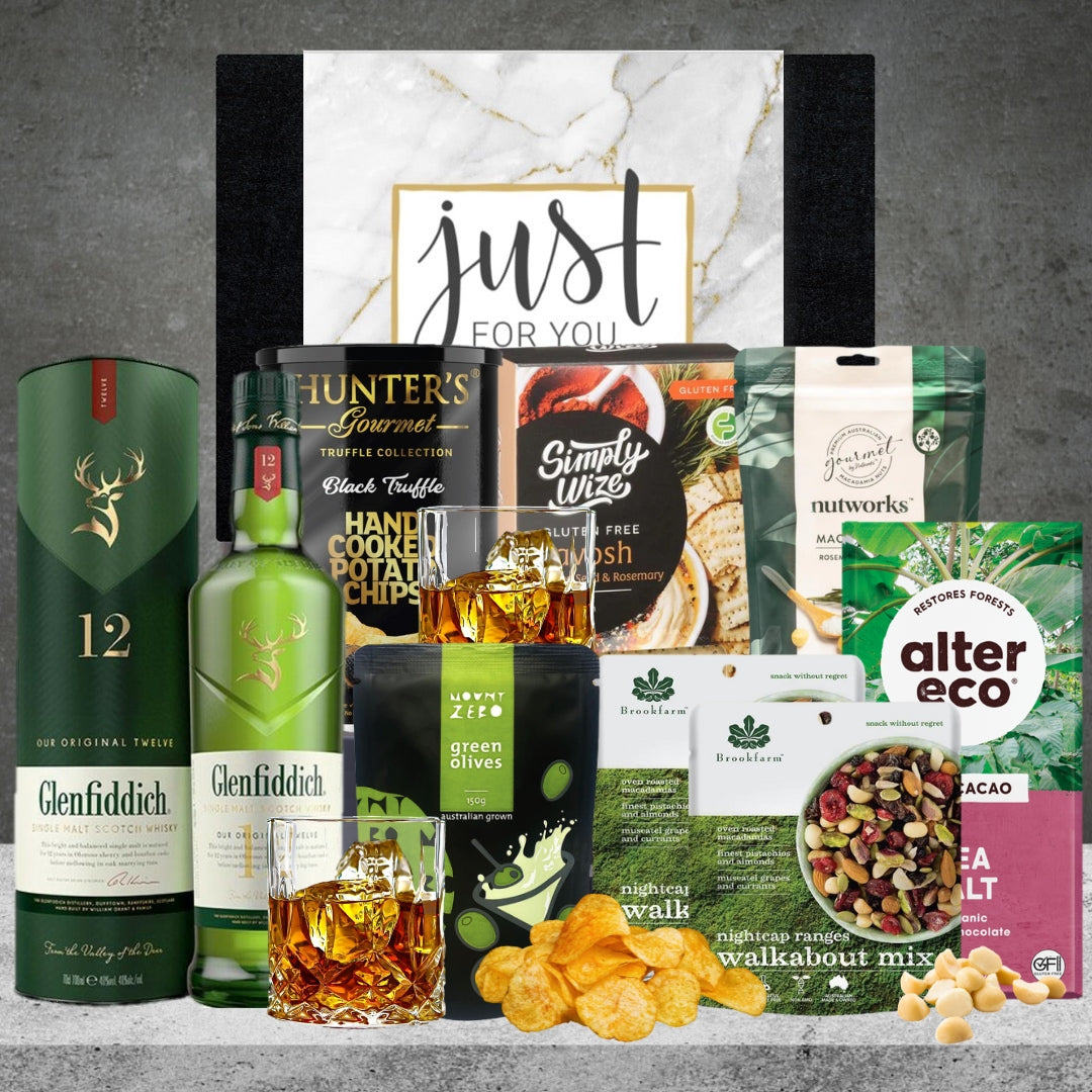 A Vegan Whiskey Delight gift hamper featuring whiskey and chocolates