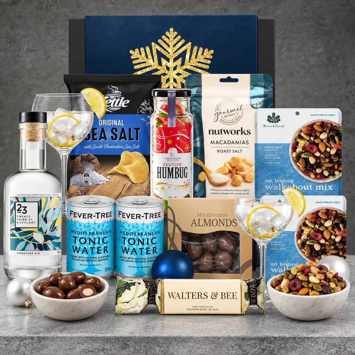 Australian Gin and Tonic Christmas Hamper featuring 23rd Street Distillery Signature Gin, Fever-Tree Mediterranean Tonic Water and festive snacks.