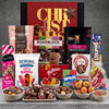 Christmas snack hamper for kids filled with Jelly Babies, Smarties, Maltesers, Nerds, Chupa Chups, cookies and rocky road
