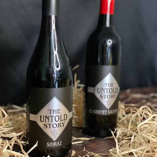 The Untold Story Chardonnay 750ml and Shiraz 750ml bottles